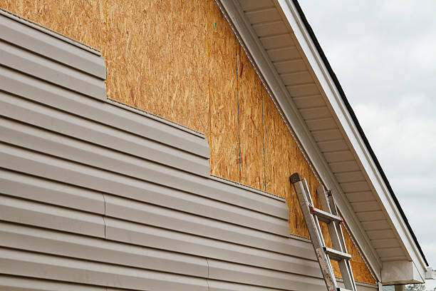 Professional Siding Installation technician working in Brownstown, PA